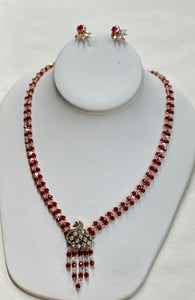 Chetan Ruby And Swarovski Crystal Necklace And Earring Set(24k Gold Plated Beads)