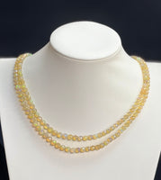 AAA-Quality Ethiopian Fire Opal Round Graduated (4mmx6mm)(Sold Per Strand)