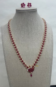 CHETAN RUBY AND SWAROVSKI PEARL NECKLACE WITH EARRINGS SET (24K GOLD COATED BEADS